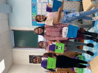 A group of children in a roomDescription automatically generated with low confidence